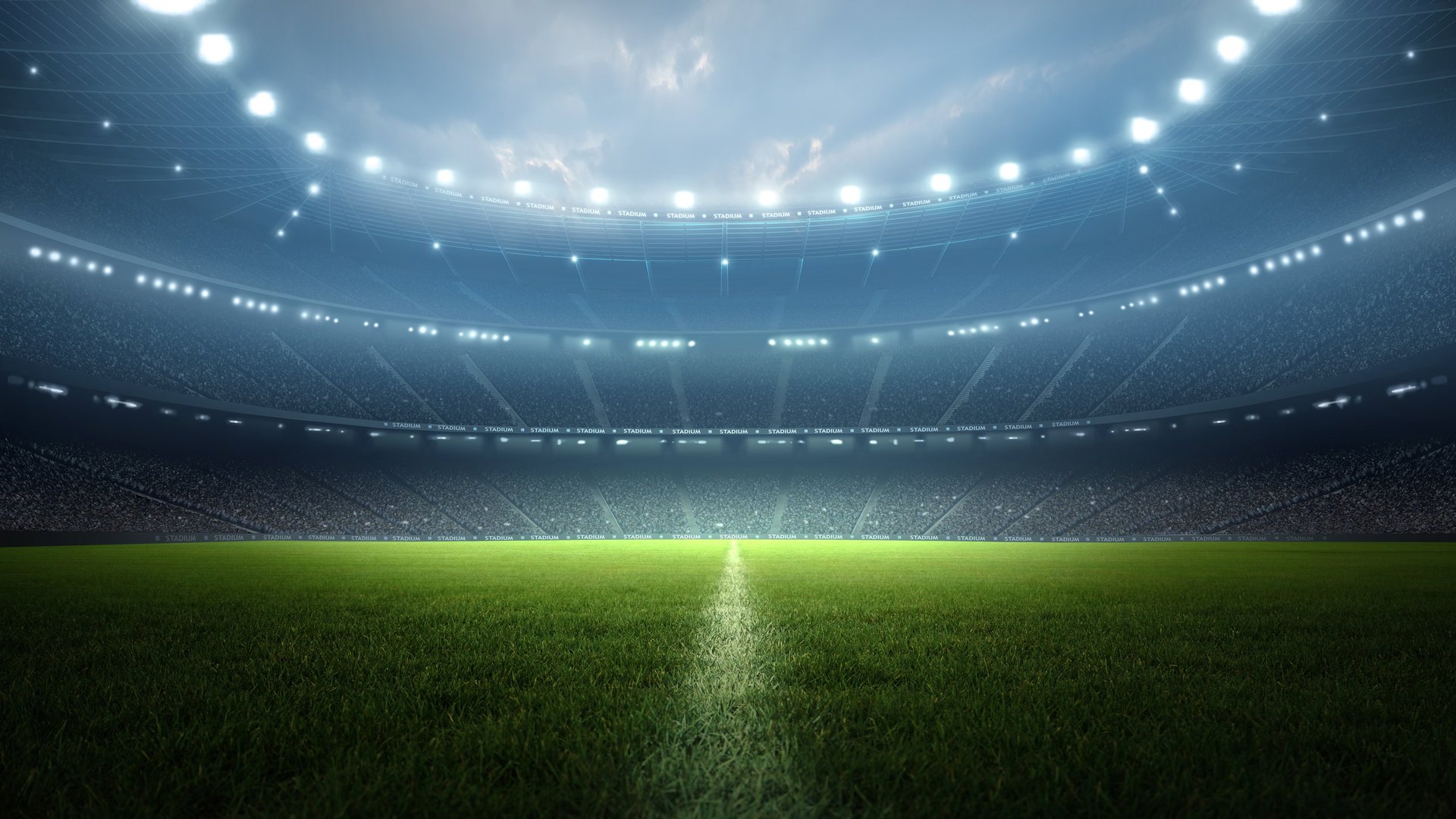 Estadio de fútbol épico con iluminación dramática